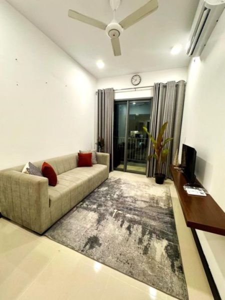 Living Room - Modern 1-Bedroom Apartment for Rent at TRI-ZEN Residencies