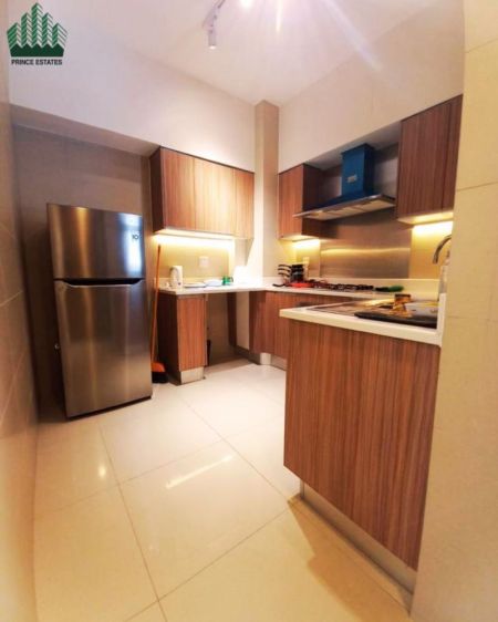 Kitchen - Fully Furnished 1BR at Havelock City – The Perfect Home for Urban Professionals