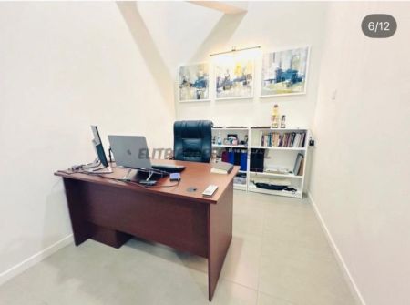 Kitchen - A modern 4-bedroom, 3-bathroom commercial/residential house located on a quiet lane 
