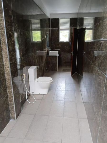 Bathroom - This stunning multi-storey residence offers the perfect blend of comfort, privacy, and convenience, making it ideal for 