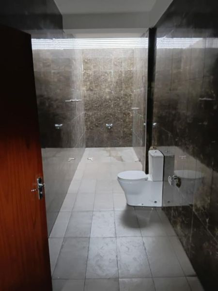 Bathroom - This stunning multi-storey residence offers the perfect blend of comfort, privacy, and convenience, making it ideal for 