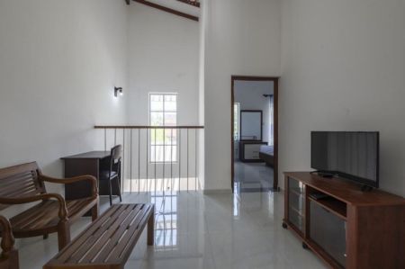 Living Room - Charming 2-Bedroom Santorini Villa with Resort Amenities for Short Term Rent